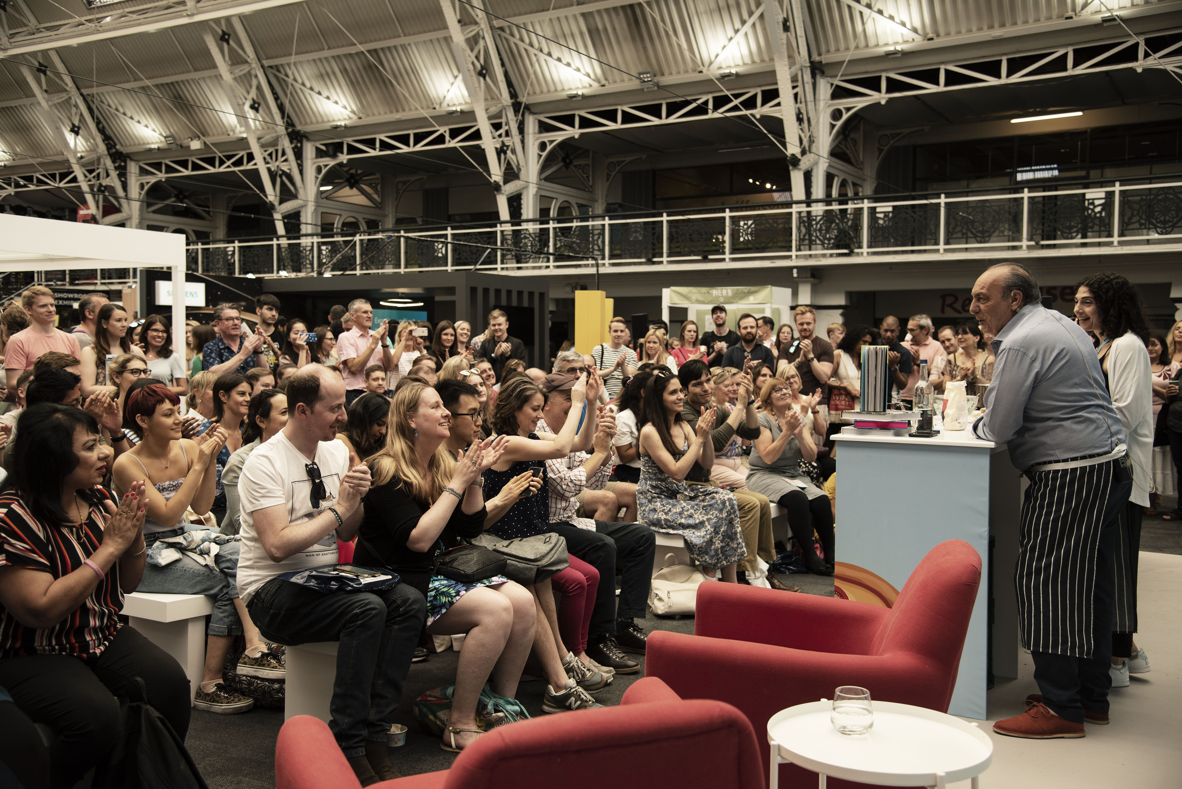 People clapping during the Traveller Food Festival show