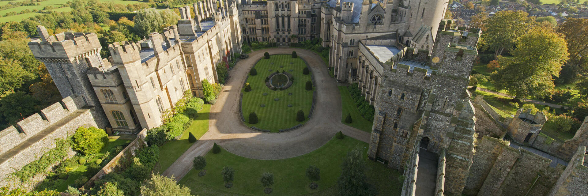 Aerial view of a castle and the countryside beyond