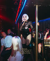 A performer on stage at Brighton's Proud Cabaret