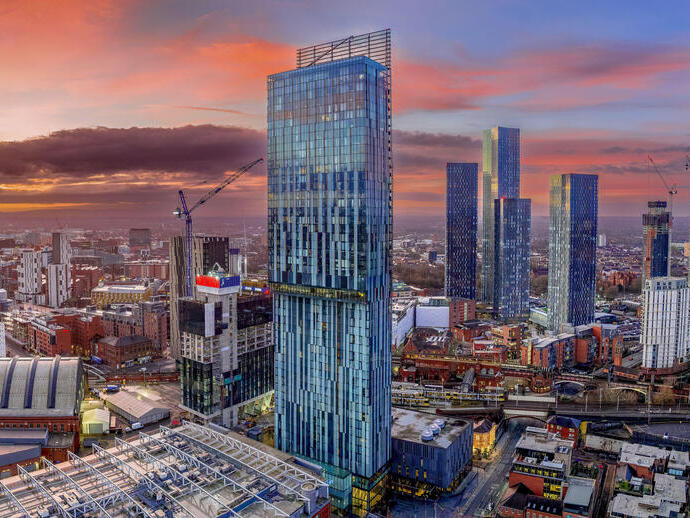 Aerial night view of high rise buildings in a large city