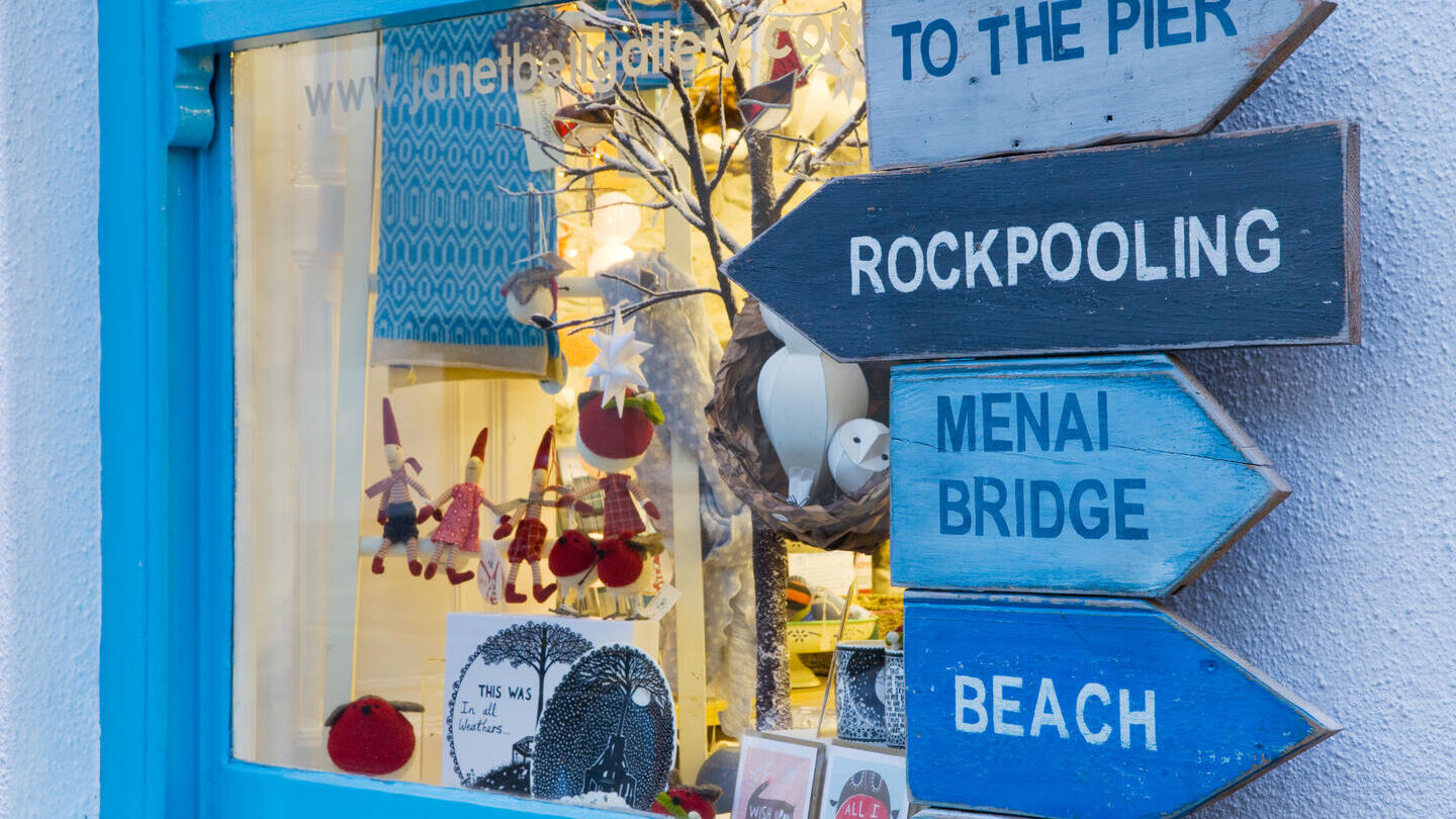 A gallery window filled with cards and decorations