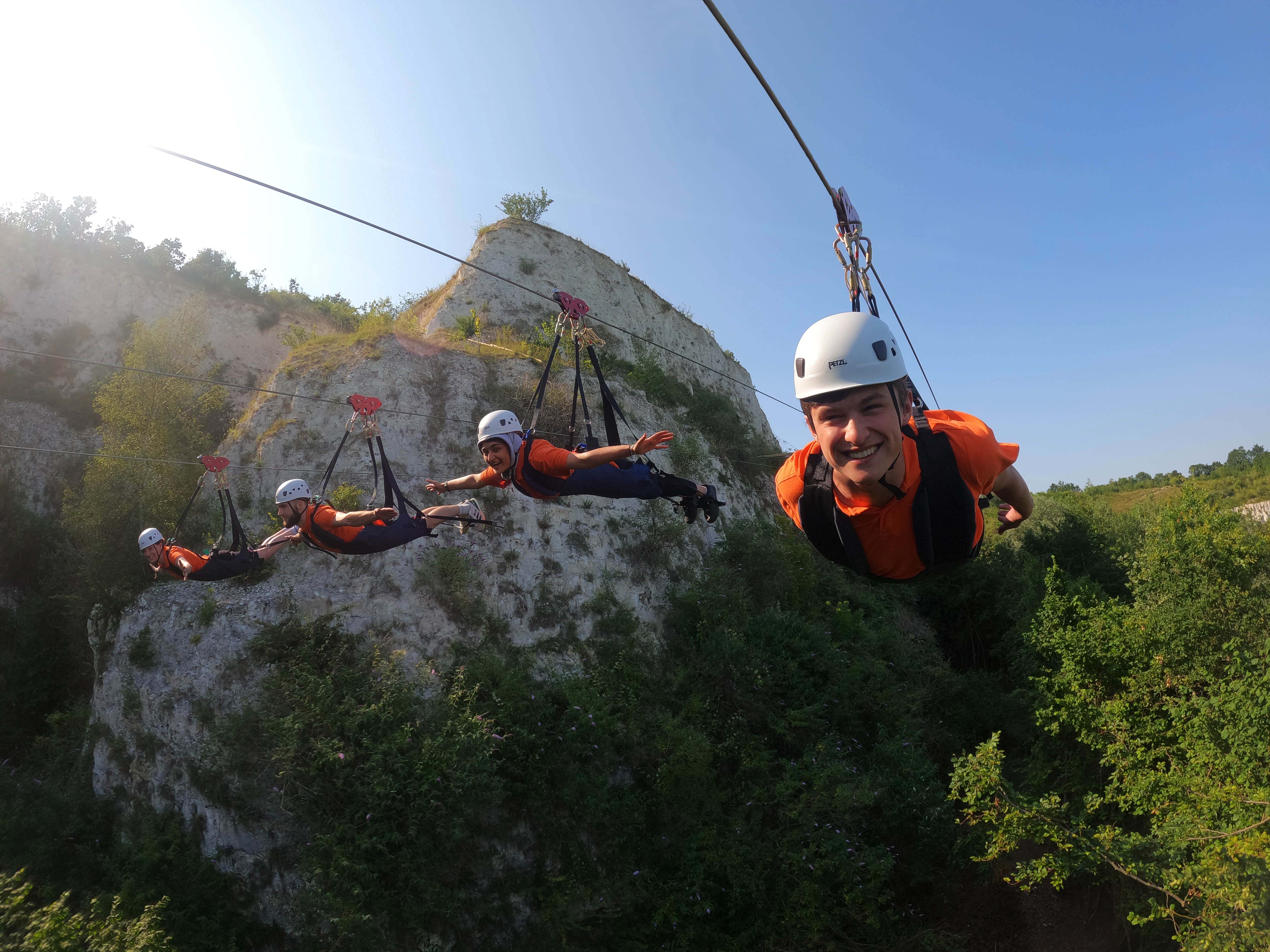 Four people suspended on ziplines at Hangloose in Bluewater, Kent