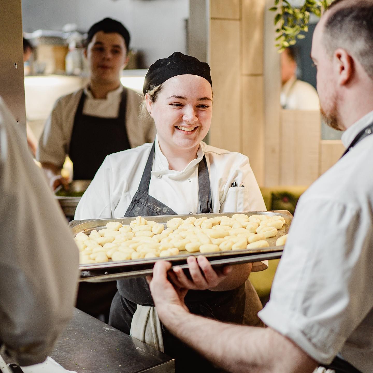A chef preparing food at The Kitchin
