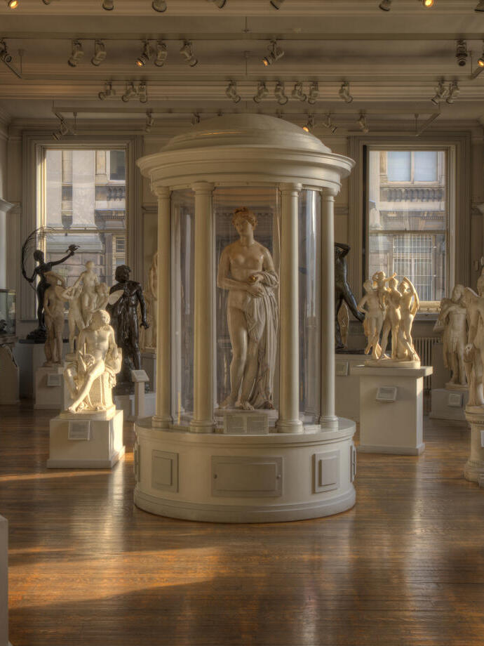 Classical sculptures on display in a gallery