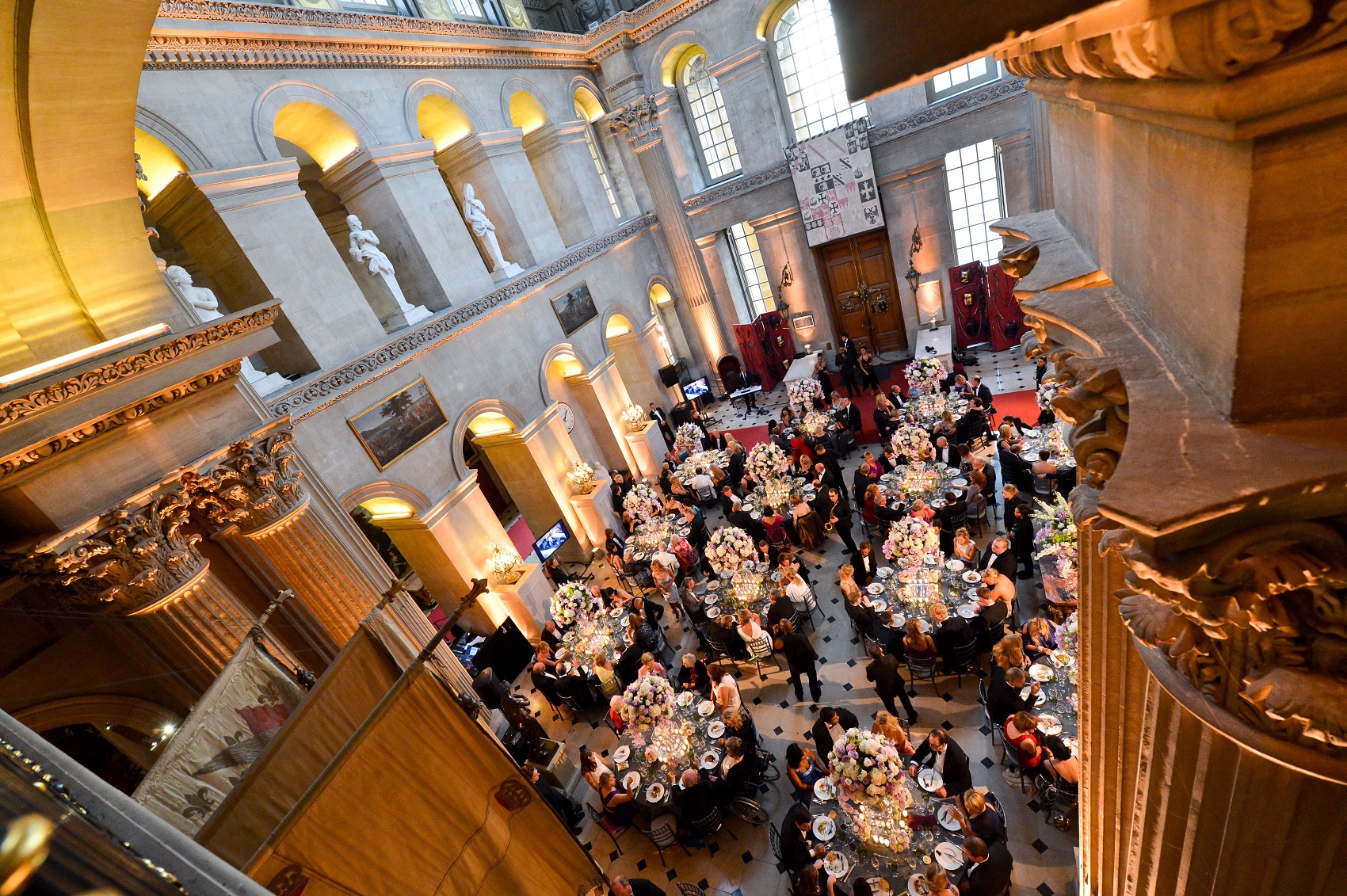 High angle view of people dining inside an historic palace