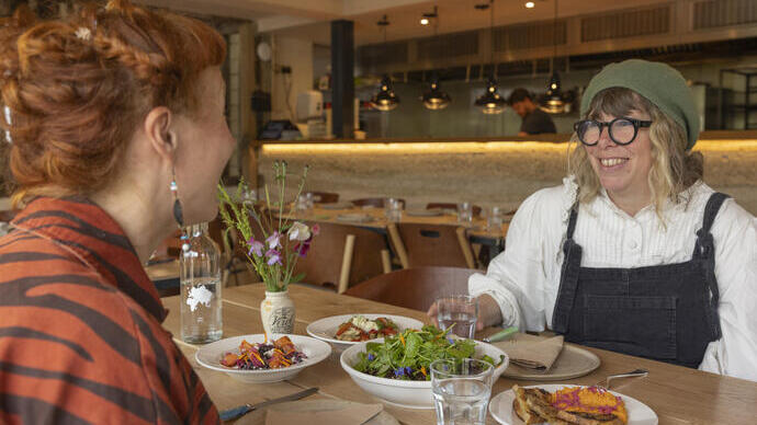 Two women enjoy lunch in a restaurant