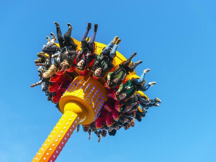 People riding a fairground ride