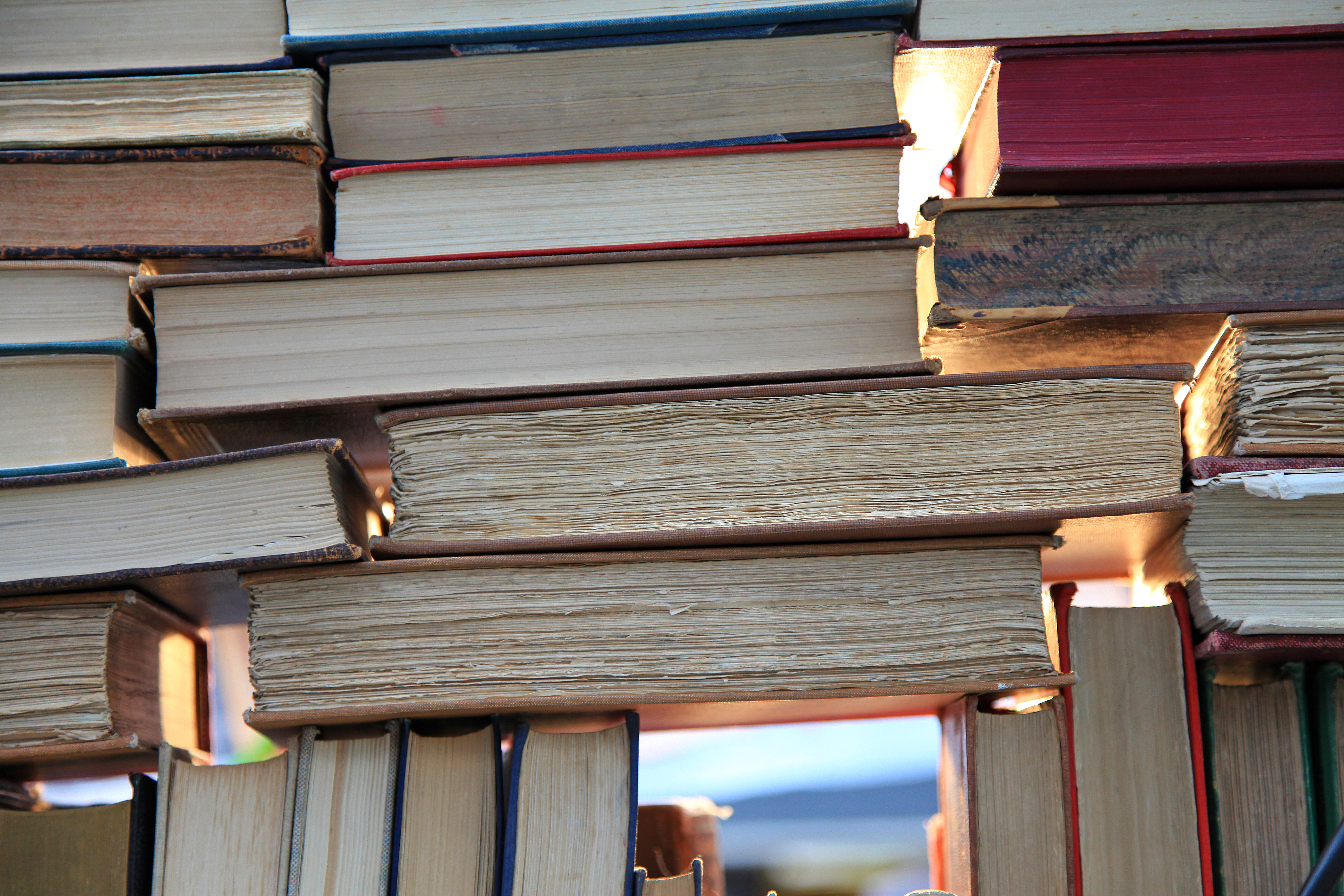 Old books on a table at a flea market