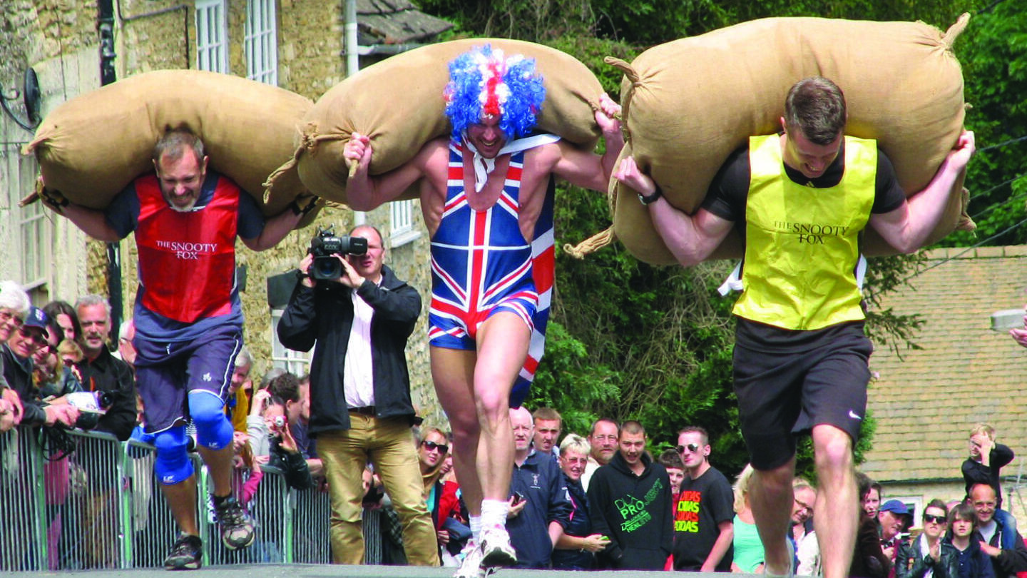 People taking part in a sack race