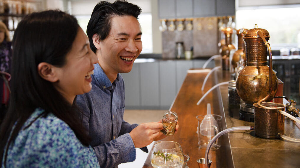 Couple on a gin tasting experience at a distillery