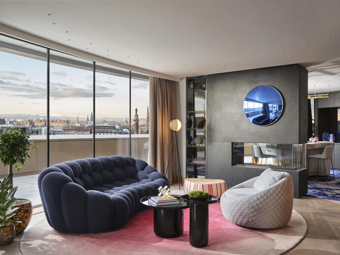 An interior shot of a hotel room in W Edinburgh with panoramic views across the city.