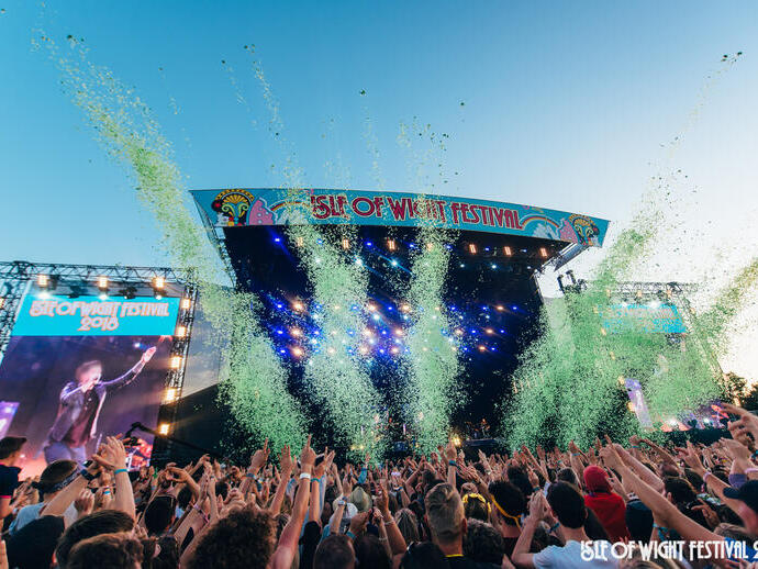 Crowd in front of the main stage at a music festival