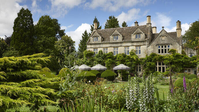 An outdoor view of the Pig Hotel in the Cotswolds