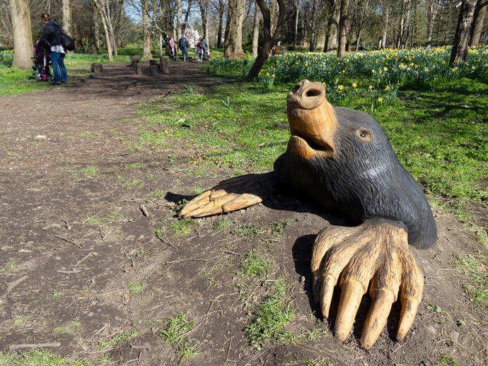 A wood sculpture of a mole in Bute Park, Cardiff