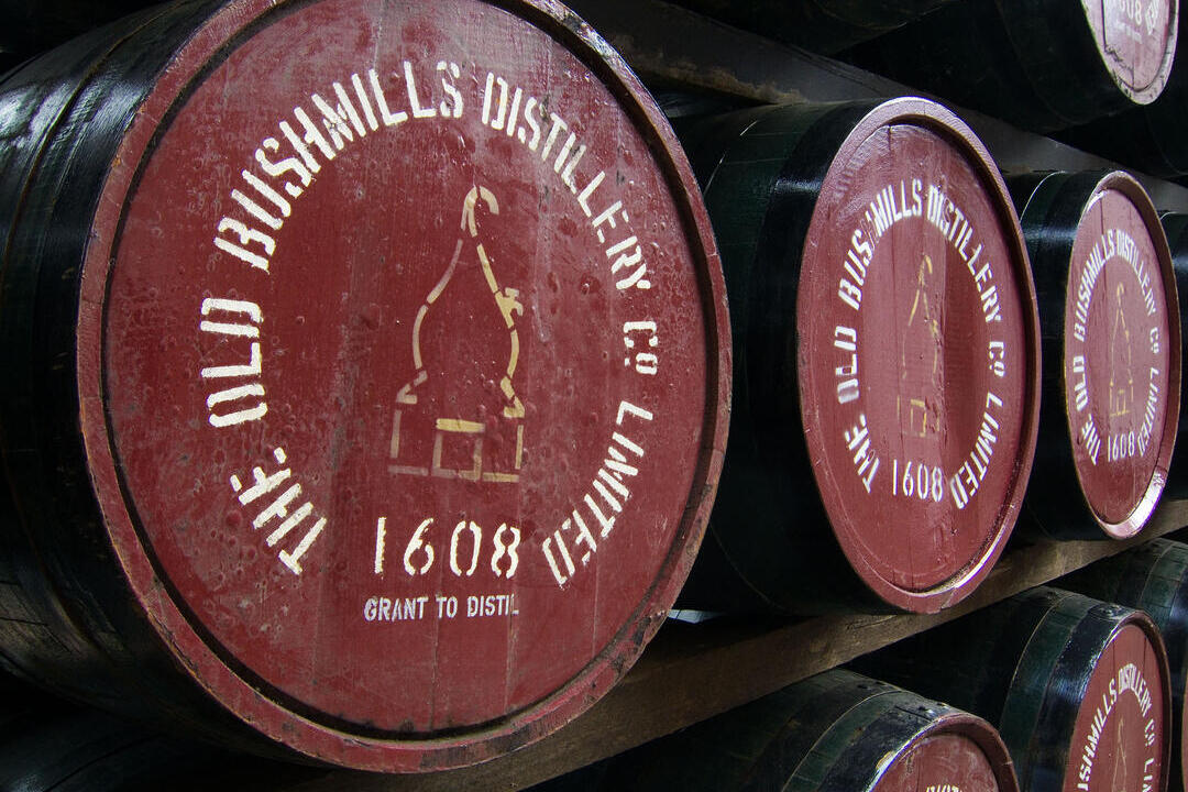 Wooden barrels casks at an old whiskey distillery.