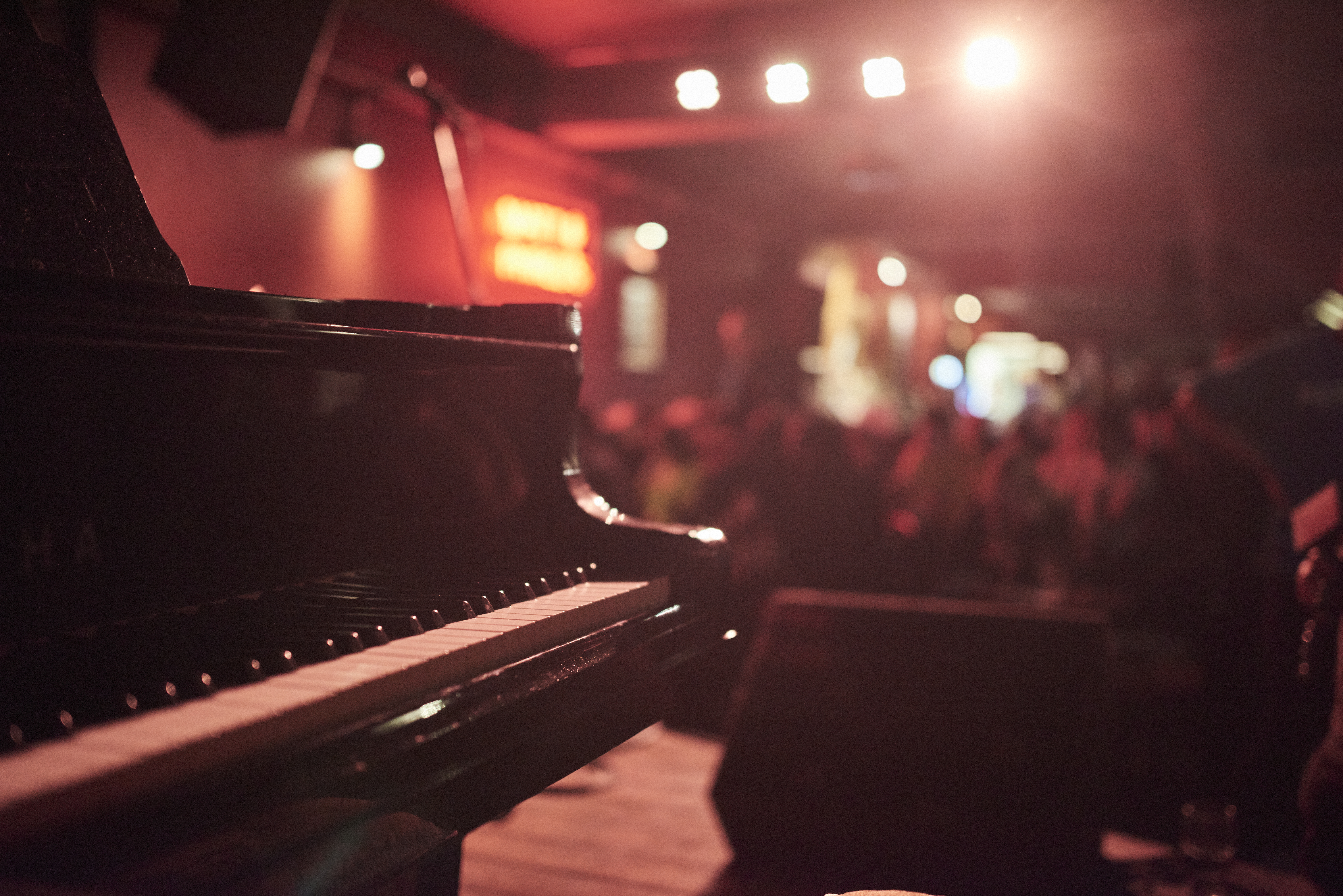 Piano on a stage in a bar