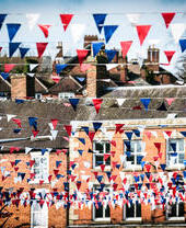 Red, white and blue bunting flags line the streets of Ashbourne in Derbyshire