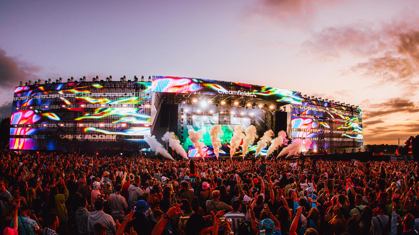 Crowd in front of the main stage at a music festival