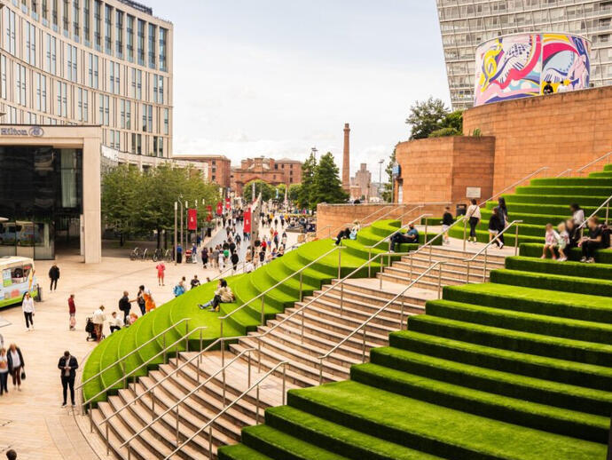 Outdoor grassy steps of a shopping centre