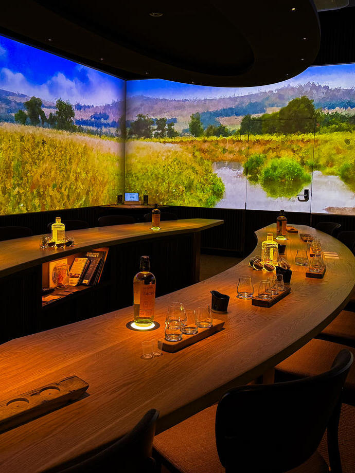A cosy and intimate whisky distillery tasting room.