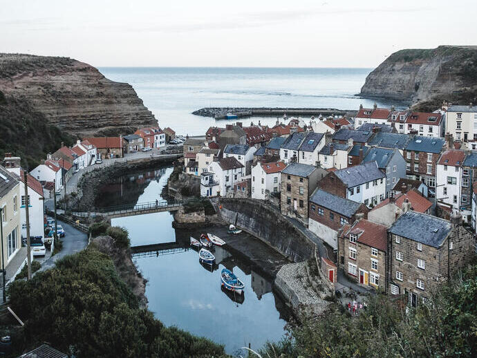 Coastal village with harbour and boats