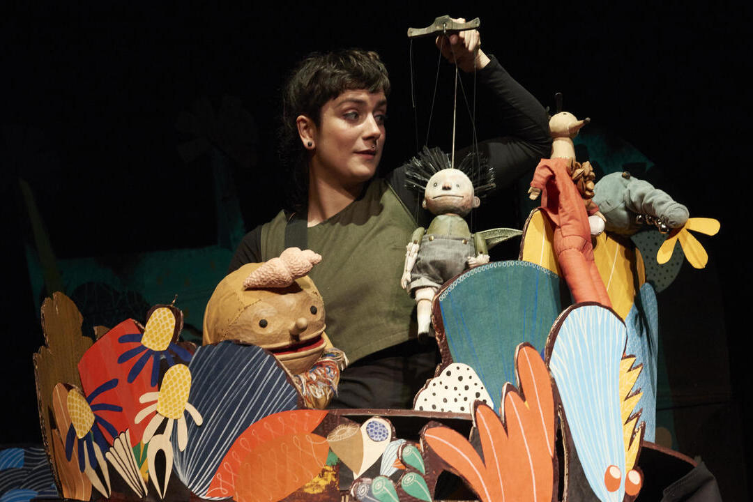 A performer on stage at Norwich Puppet Theatre