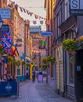 A view down a shopping street in a city