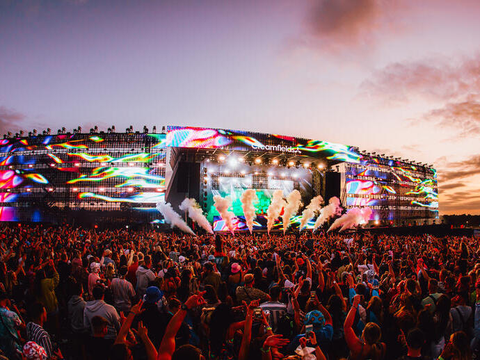 Crowd in front of the main stage at a music festival