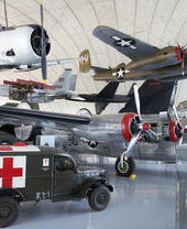 An array of military vehicles on display at the American Air Museum in Duxford