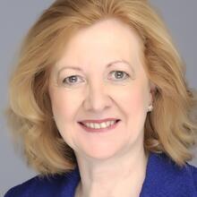 Victoria-Borwick-mid-blue-suit-sm