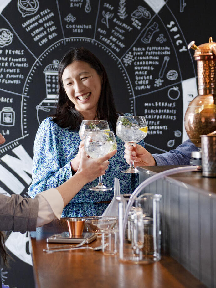 a girl in a wheelchair and her friends on a gin tasting distillery experience 