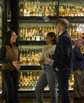 A couple on a guided tour of The Scotch Whisky Experience