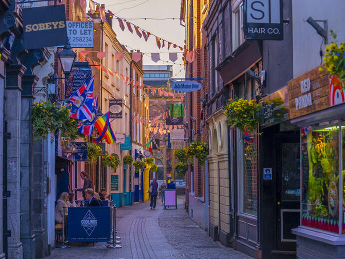 A view down a shopping street in a city