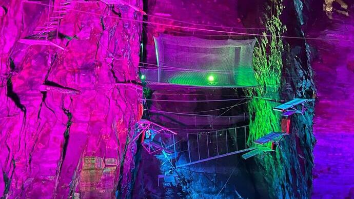 Snowdonia’s Zip World Slate Caverns lit up with neon lights