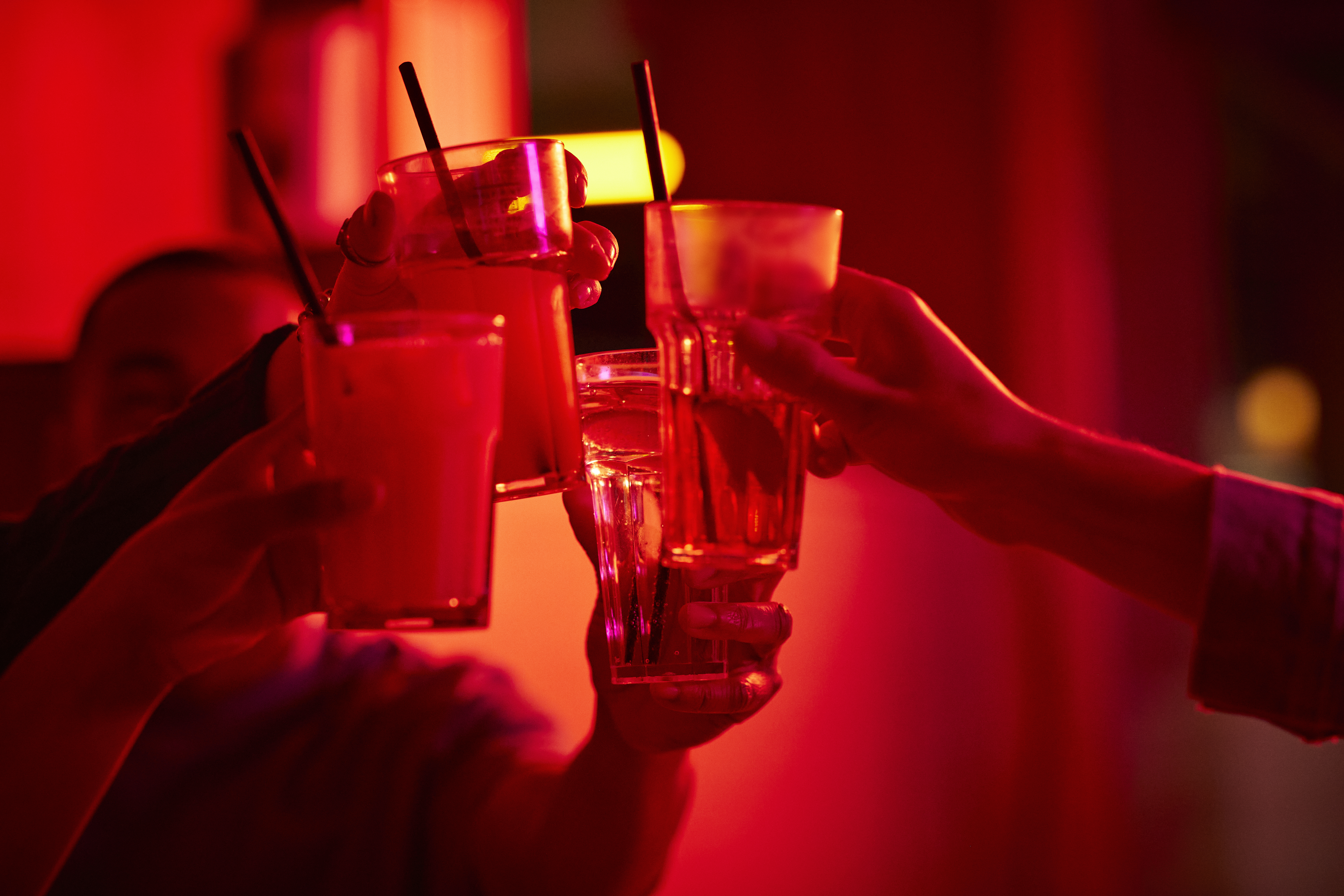Friends toasting drink glasses