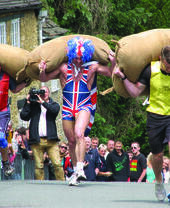 People taking part in a sack race