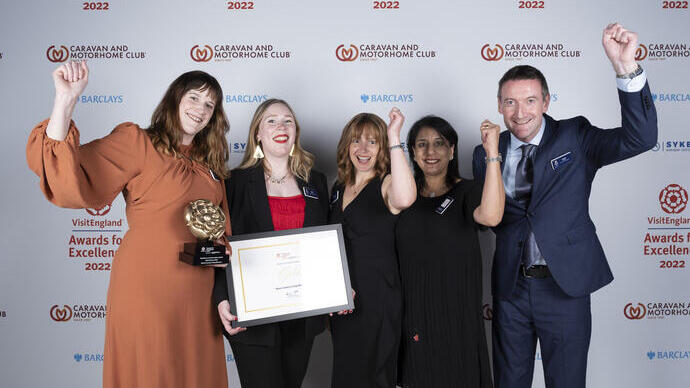 Photo of Gold Winners for Resilience and Innovation Award - Black Country Living Museum - in front of the branded photo backdrop