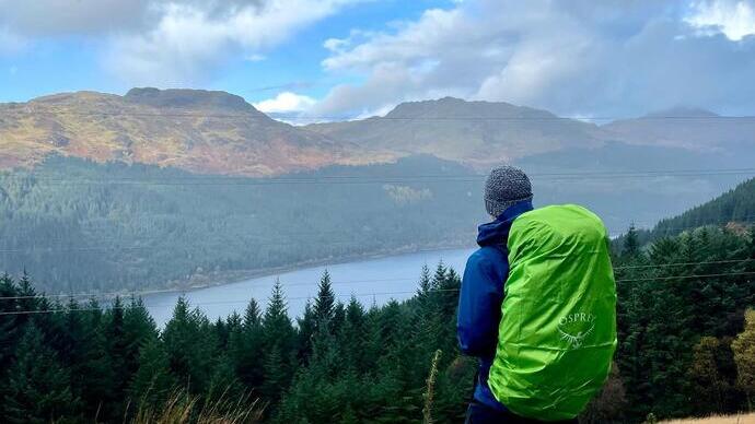 A man hiking in Gare Loch, Argyll and Bute, Scotland