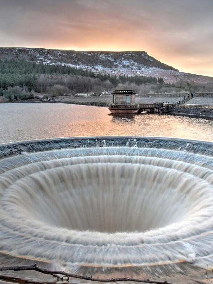 Looking across a large reservoir and it's central plug hole.