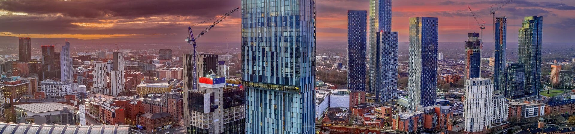 Aerial night view of high rise buildings in a large city