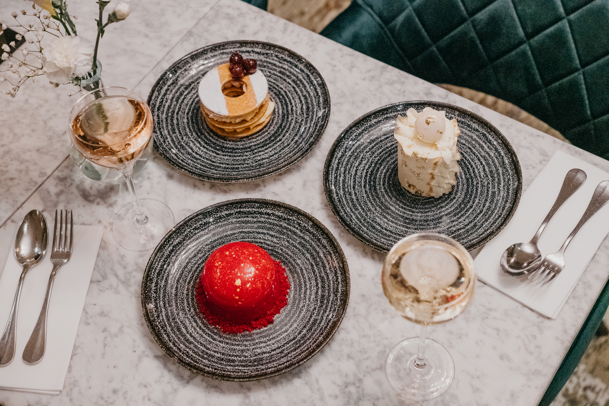 Plates of food being served on a table at Fourth Floor Bar in Harvey Nichols Leeds