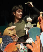 A performer on stage at Norwich Puppet Theatre
