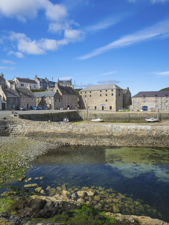 A landscape shot of a harbour town on a sunny day.