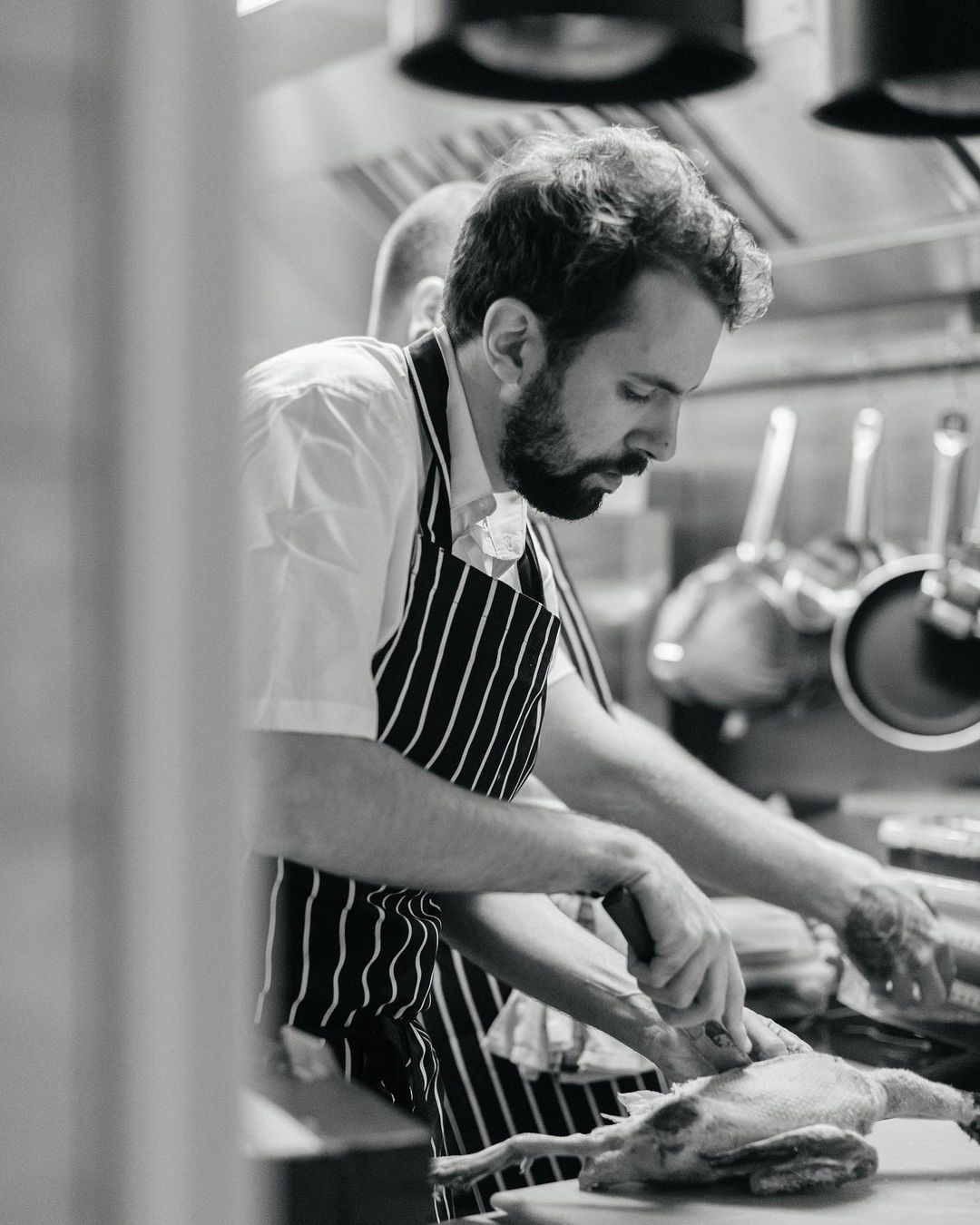 Chef preparing food at restaurant