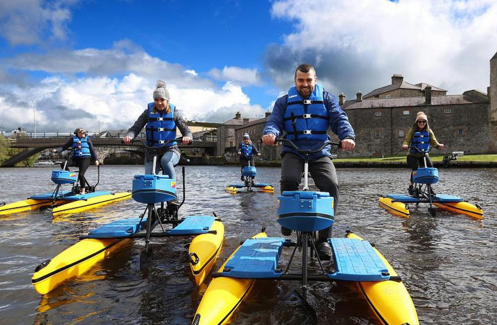 People on hydrobikes on the river Erne, Enniskillen