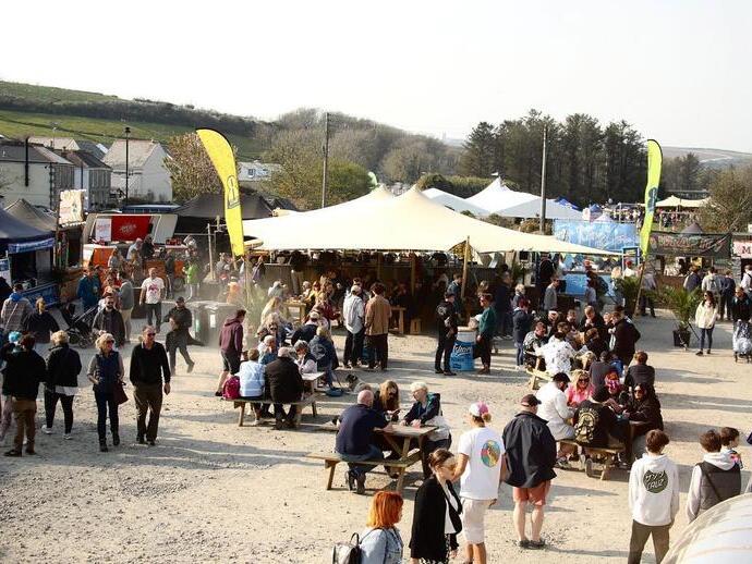 Group of people visiting food stands during festival