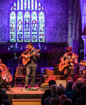 Antonio Forcione Quartet on stage at St. Andrews Church in Grinton