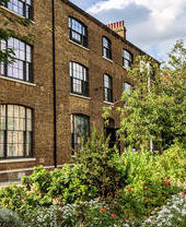 Granary building with trees in foreground