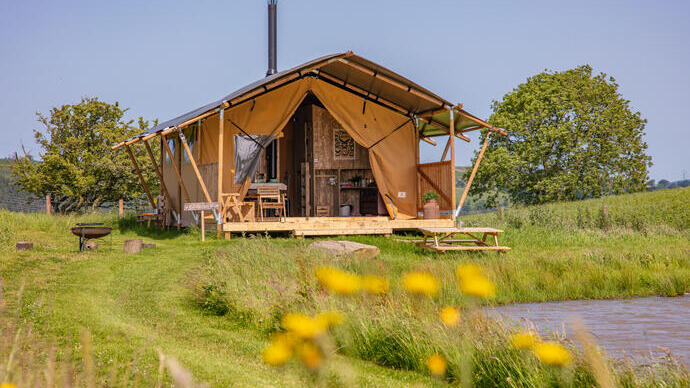 Glamping tent in a field