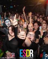 A group of people posing during a club night at Queenshilling in Bristol